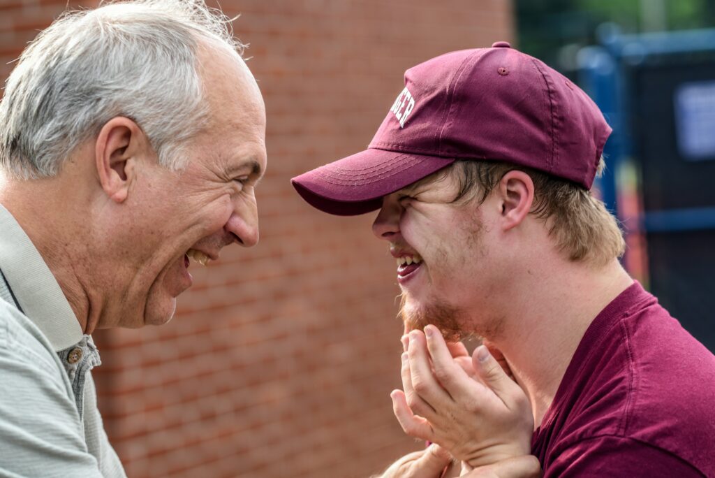 JMJ Disability news - father and son smiling